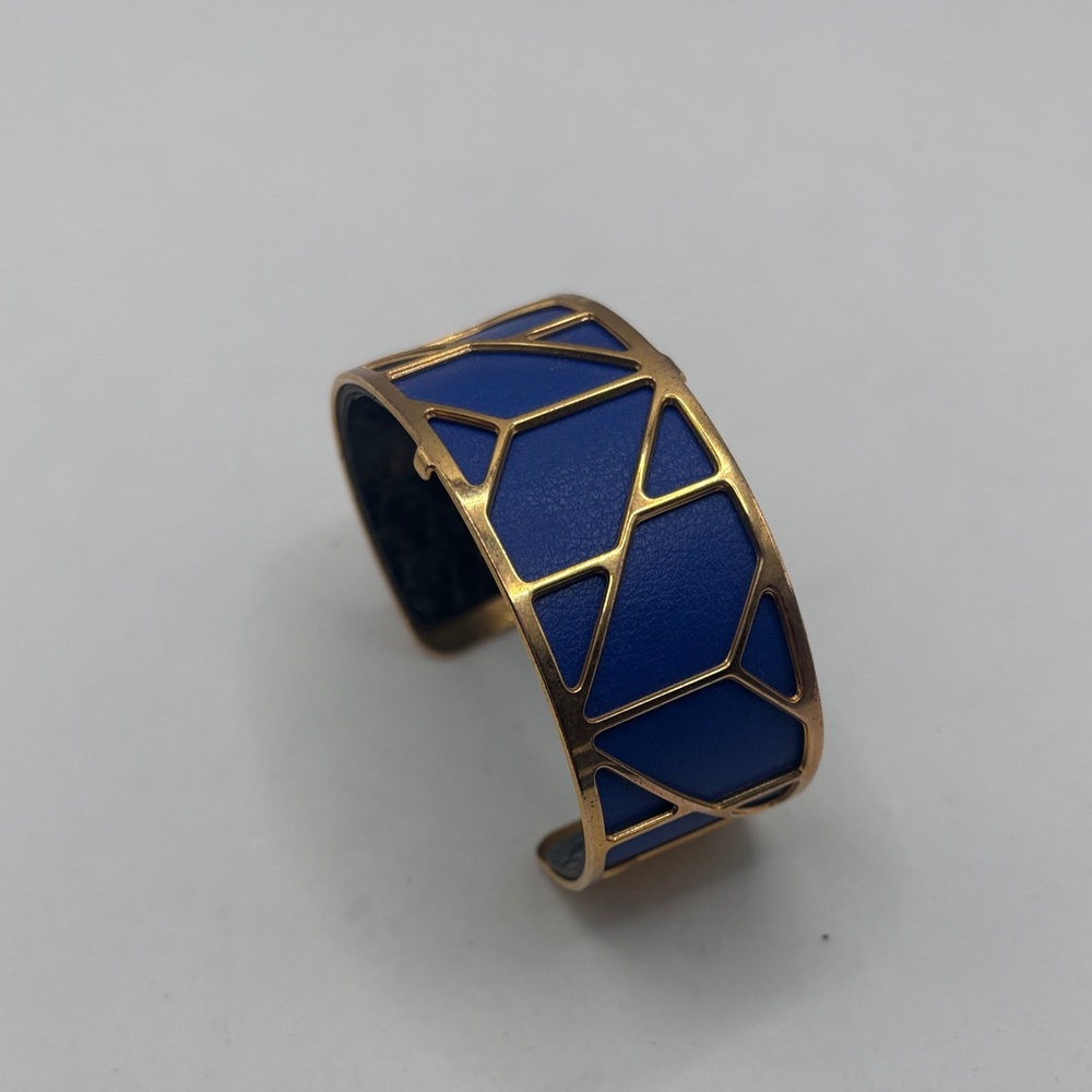 Les Georgettes Solaire gold-finish cuff bracelet Capri blue leather insert Euro
